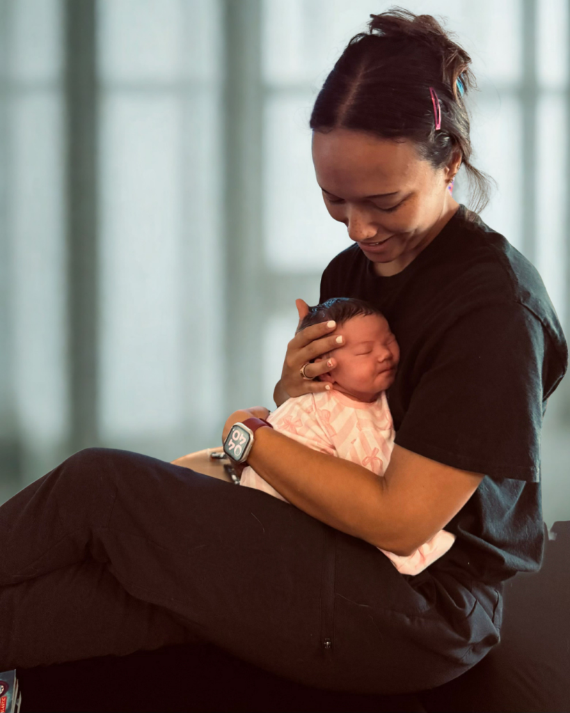Chiropractor in Roanoke, TX adjusting a baby
